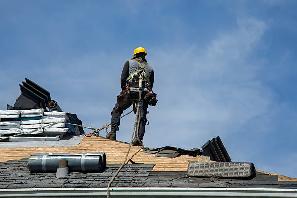 Professional Roof Replacement technician working in Hartland, MI